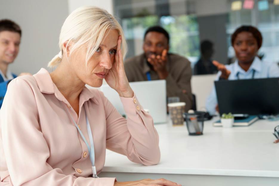 Woman getting talked down to by male coworkers - Sexual Discrimination